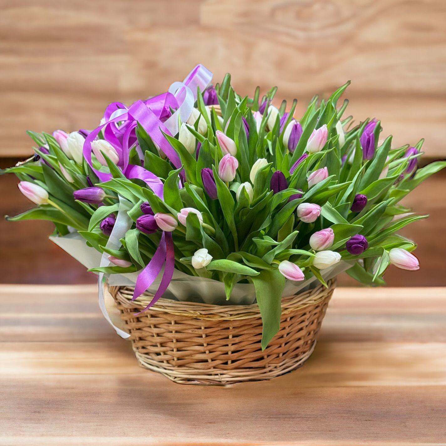 Bouquet 101 tulips mixed in basket