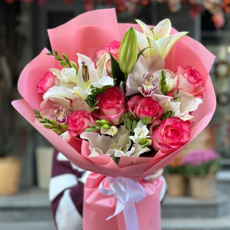 pink rose (7 pcs.), white lily, white freesia, white cymbidium, packaging, ribbon